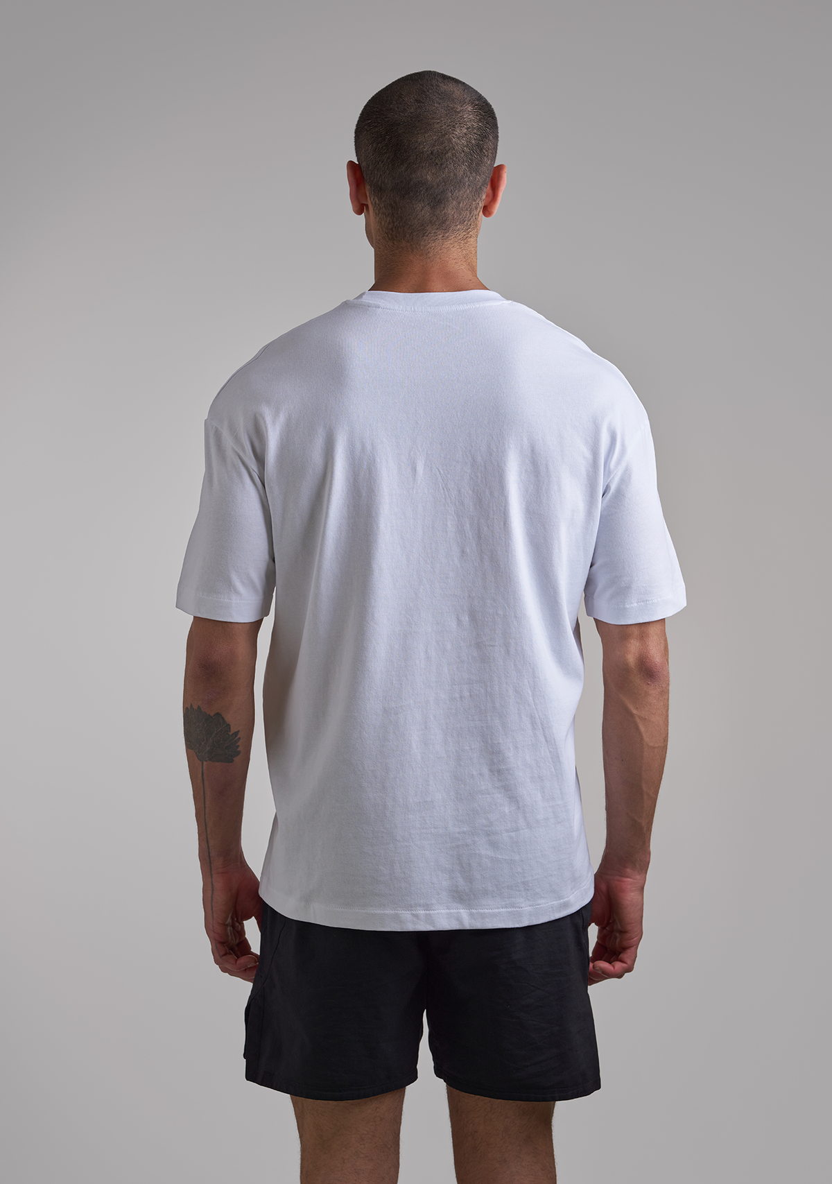 White Basic Shirt with Green Logo